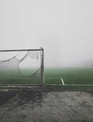 Torn Football Net Wallpaper