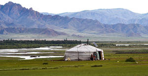 Traditional Mongolian Yurt In The Heart Of Altai Mountains Wallpaper