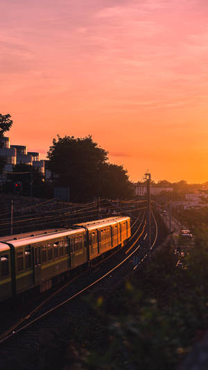 Train With Orange Sky Wallpaper