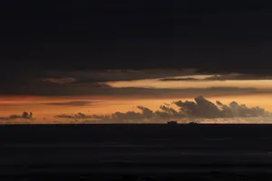 Tranquil Boat Journey Wallpaper