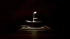 Tranquil Display Of Shiva Lingam Stone Wallpaper