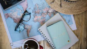 Travel Planning Essentials Flatlay Wallpaper