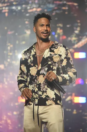 Trey Songz Captivates Fans With His Mesmerizing Performance Wallpaper