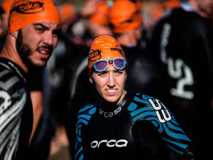 Triathlon Athlete Wearing Orca Brand Wallpaper