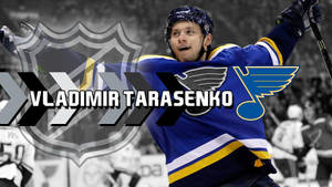 Triumph Moment Of Vladimir Tarasenko - Celebratory Gesture With Nhl Badge Wallpaper