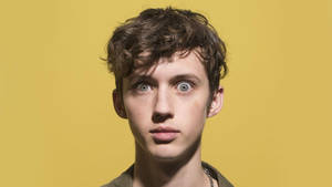 Troye Sivan Quirky Yellow Wallpaper