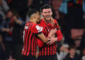 Two Afc Bournemouth Football Players Wallpaper