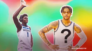 Two Basketball Players With Their Hands Up Wallpaper