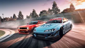 Two Cars Are Racing On A Track Wallpaper