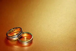 Two Gold Wedding Rings Wallpaper