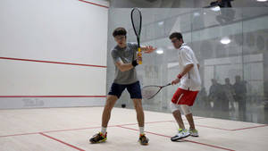 Two Men Playing Squash Wallpaper