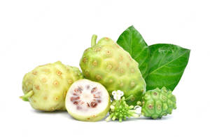 Two Noni Fruits With Leaves Wallpaper