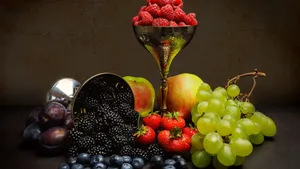 Two Silver Cups Of Raspberries Wallpaper