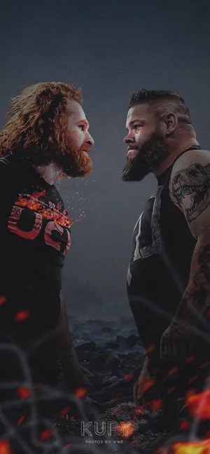 Two Wrestlers Standing In Front Of Fire Wallpaper