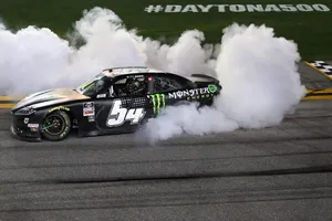 Ty Gibbs Victoriously Smoking Tires At Daytona 500 Wallpaper