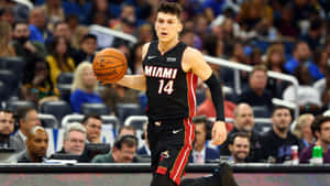 Tyler Herro Displaying His Nba All-star Skills Wallpaper