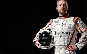 Tyler Reddick Holding His Helmet Wallpaper