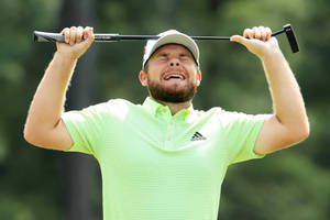 Tyrrell Hatton In Action During A Professional Golf Tournament Wallpaper