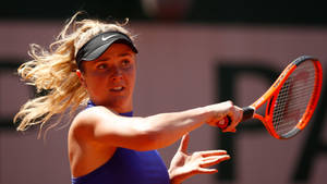 Ukrainian Tennis Star Elina Svitolina In Action Wallpaper