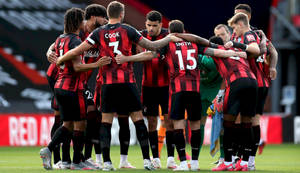 Unified Strength - Afc Bournemouth Team Huddle Wallpaper