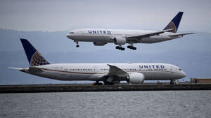 United Airlines Fleet On The Runway Wallpaper