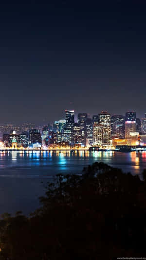 Upgrade To The Stylish Miami Iphone For A Unique Experience Wallpaper