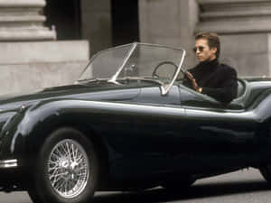 Val Kilmer Classic Car Drive Wallpaper