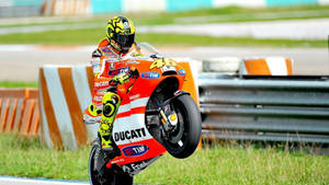Valentino Rossi Riding For Ducati Wallpaper