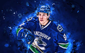 Vancouver Canucks Bo Horvat On Blue Wallpaper