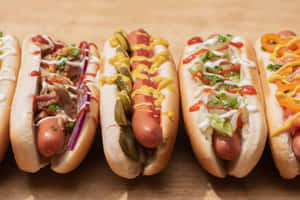 Variety Hot Dogs Wooden Table Wallpaper