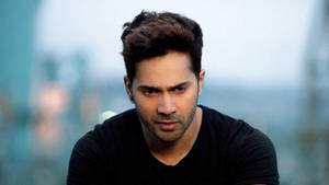 Varun Dhawan In A Black Tee Wallpaper