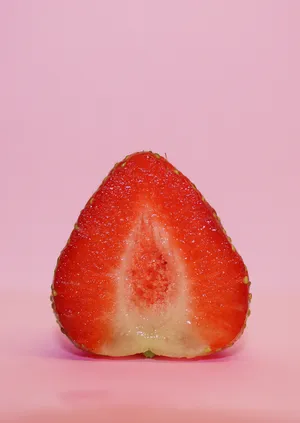 Vertically Cut Strawberry Fruit Wallpaper