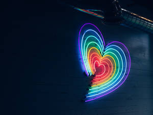 Vibrant Arc Of Colours: A Blissful Rainbow Wallpaper