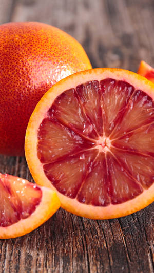 Vibrant Blood Orange Citrus Fruit With A Retro Aesthetic Wallpaper