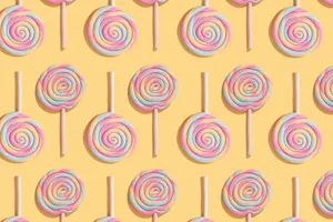 Vibrant Lollipop Candies Pattern Wallpaper