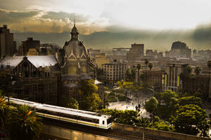 Vibrant Medellin Cityscape With Metro View Wallpaper