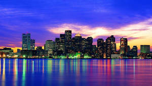 Vibrant New York Skyline By The River Wallpaper