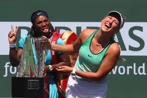 Victory Embrace - Victoria Azarenka And Fellow Player Celebrate Wallpaper