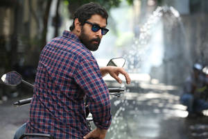 Vikram On Motorbike Wallpaper