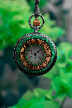 Vintage Clock In Green Wallpaper