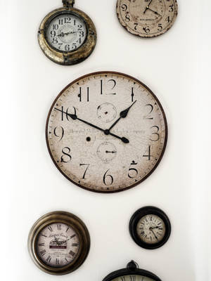 Vintage Clocks On The Wall Wallpaper
