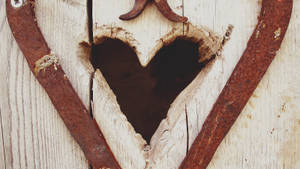 Vintage Heart Carved Out Of Wood Wallpaper
