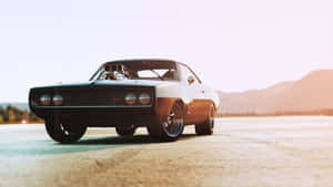 Vintage Muscle Car Sunset Wallpaper