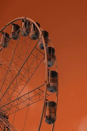 Vintage Orange Ferris Wheel Aesthetic.jpg Wallpaper