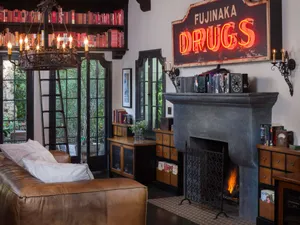 Vintage Style Living Roomwith Neon Sign Wallpaper