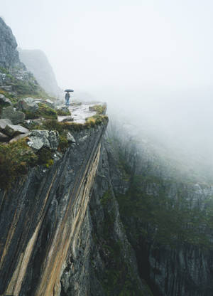 Visiting The Cliffside While It's Raining Wallpaper