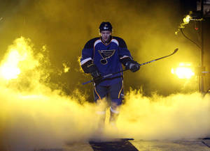 Vladimir Tarasenko Entering Ice Rink While Holding Hockey Stick Wallpaper