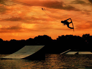 Wakeboarding Mute Grab Trick Silhouette Wallpaper