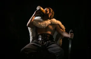 Warrior Drinking From Wooden Mug Wallpaper