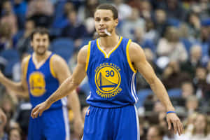 Warriors Basketball Player In Action Wallpaper